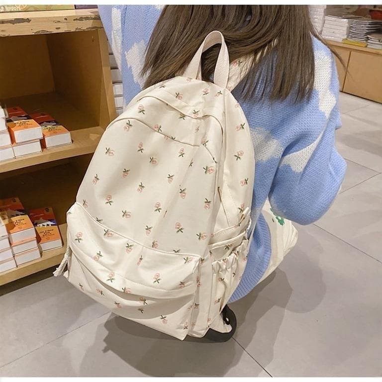 Mochila feminina em estilo japonês com pequenas estampas florais, estilo coreano Harajuku, adequada para meninas do ensi