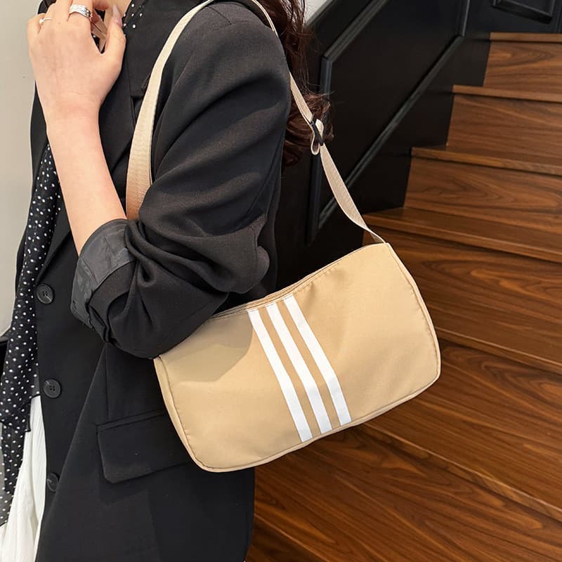 Bolsa feminina de grande capacidade Casual bolsa leve de um ombro novo estilo moda moderna simples listrada bolsa de via