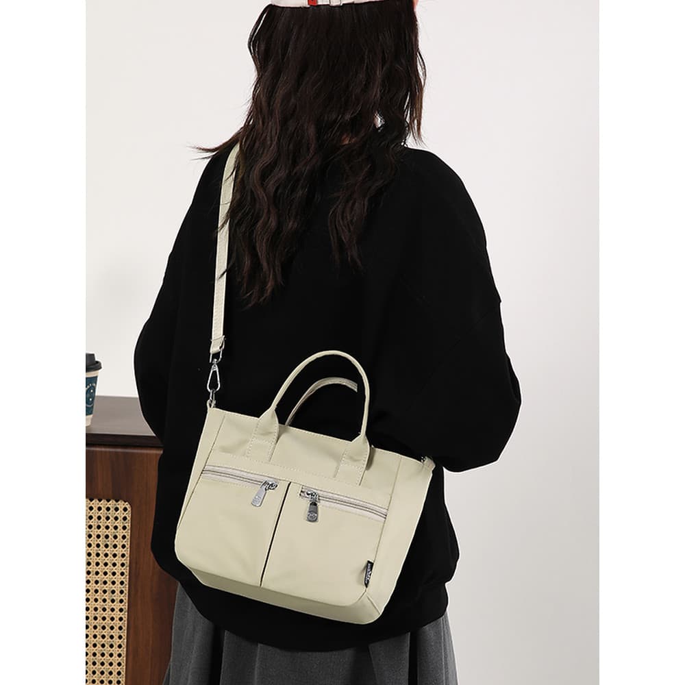 2025 novo estilo sacola de grande capacidade feminina Commuter à prova dwaterproof água portátil saco do mensageiro mult