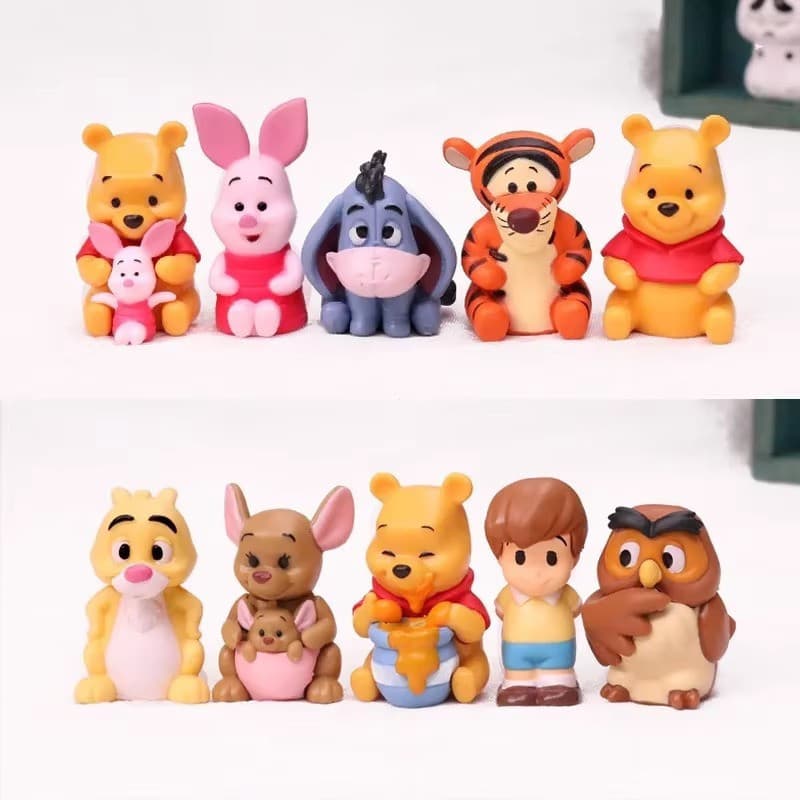 Um conjunto contendo 10 figuras do Winnie the Pooh, incluindo Christopher, Eeyore, Piglet, Tigger, Owl, Abel, Eeyore e G