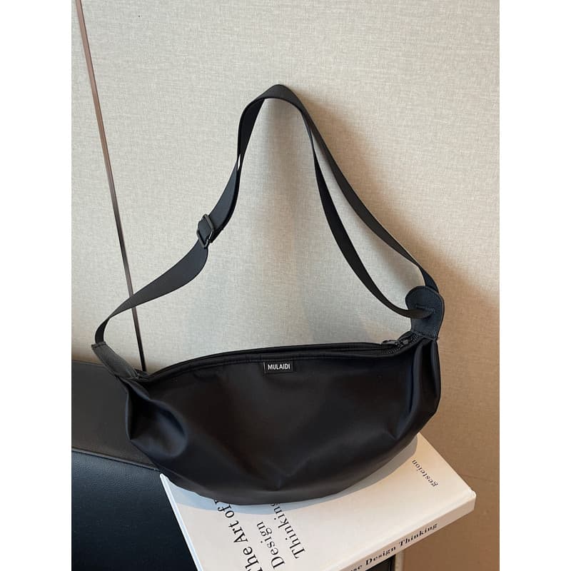 Bolsa mensageiro feminina 2026 novo estilo simples moda lona bolsa de ombro trabalho diário Commuter leve saco esportivo