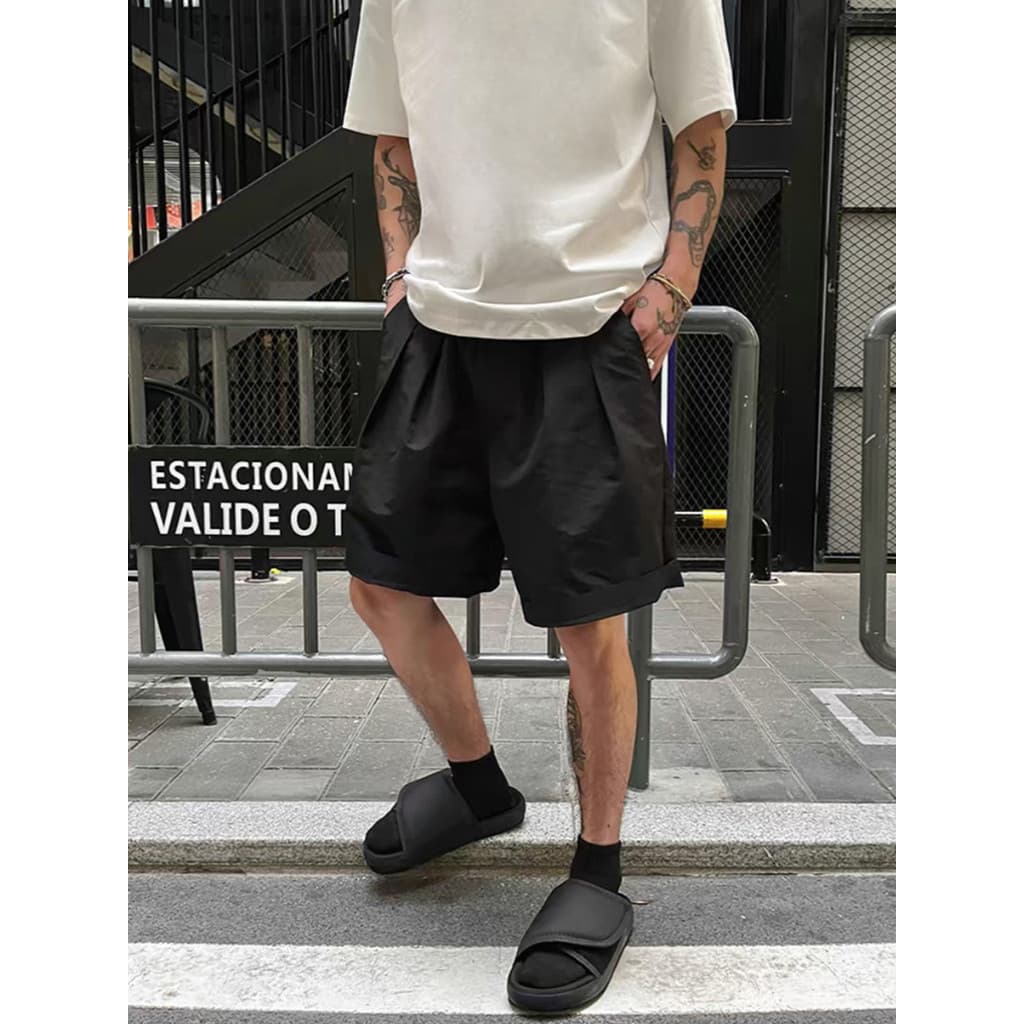 Verão novo estilo Shorts de secagem rápida perfil masculino solto duplo plissado Design preto macacão calças de cinco po