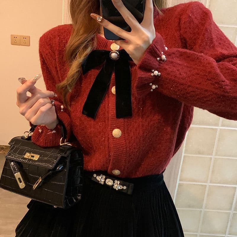 Nova luz roupas femininas maduras arco na moda jaqueta de malha Cardigan feminino nicho Design suave brilhante camisola