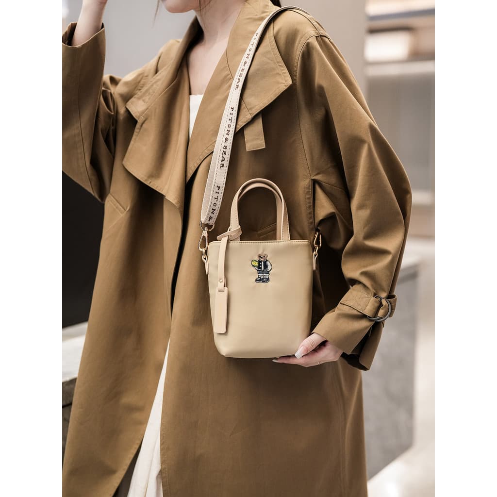 Bolsa para celular feminina mensageiro 2026 novo estilo verão High-End pequeno balde saco de lona leve Mini mão-transpor
