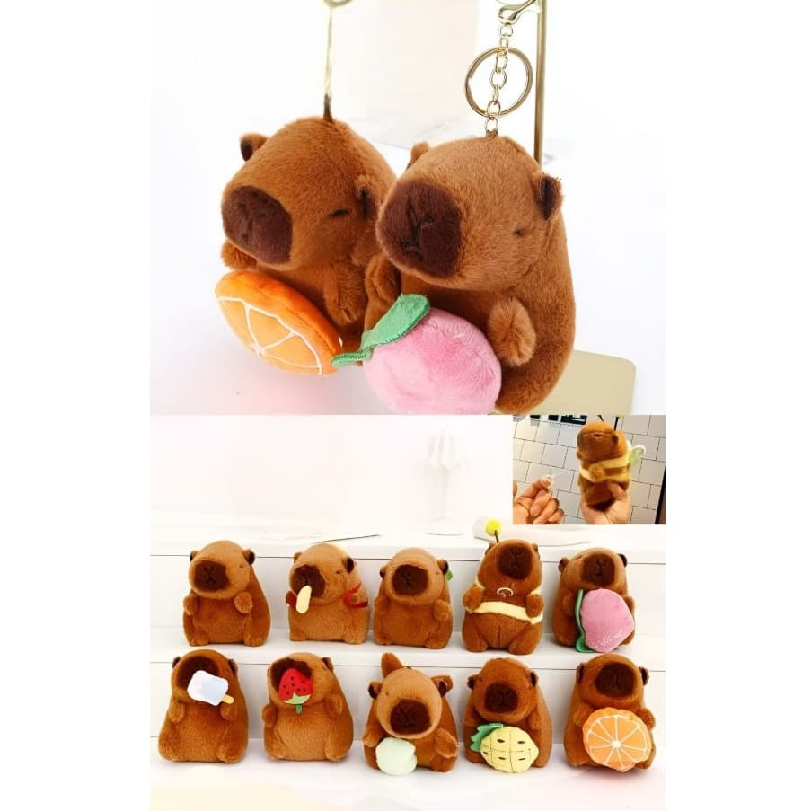 Chaveiro Capivara Segurando Frutas Brinquedo Capybara Desenho Pelúcia Fofa Push Fruta