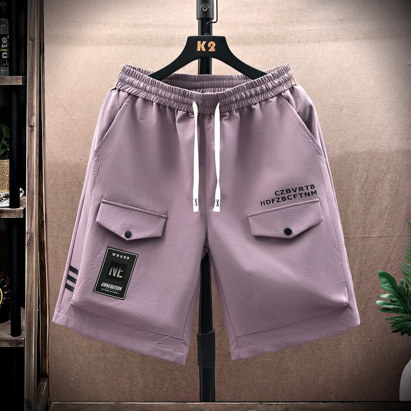 Shorts masculinos de verão soltos na moda Casual macacão 2024 novo estilo calças de cinco pontos All-match calças esport