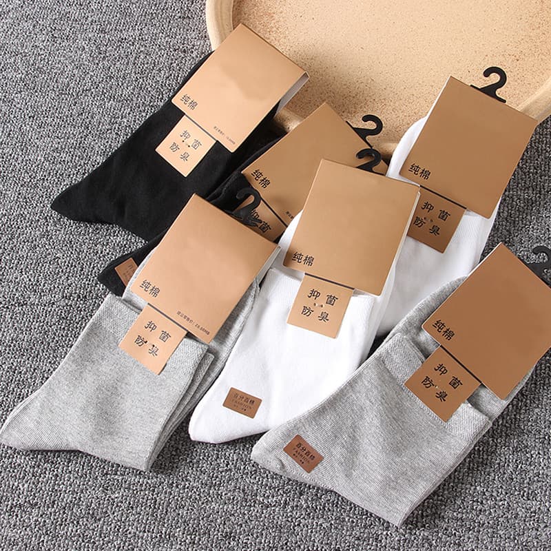 Um conjunto de cinco pares!2025 Novo estilo simples confortável fácil de usar meias masculinas de cor sólida