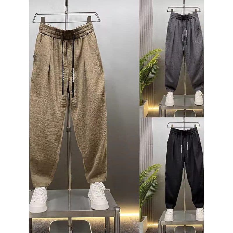 Novo verão estilo fino bonito calças casuais de seda gelo solto tornozelo comprimento Harem calças Drape masculino 2026