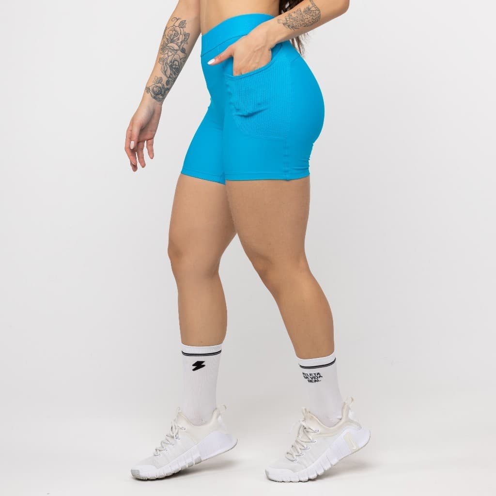 Short Fitness Feminino Alongado com Bolso em Tela Alta Compressão Cós Anatômico UV50+