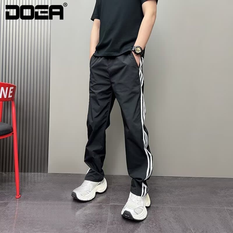 Novo produto 2026 outono novo estilo esportes masculino cor sólida na moda solto calças retas calças de perna larga tama