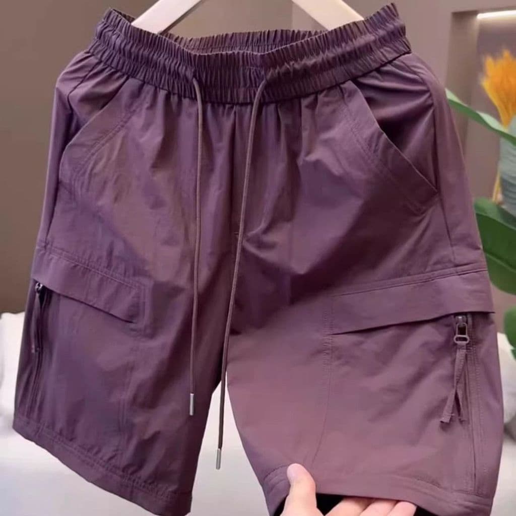 2026 Influencer Shorts Masculinos Verão Novo Estilo Moda Casual Tendência All-Match Multi-Bolso Shorts Masculinos