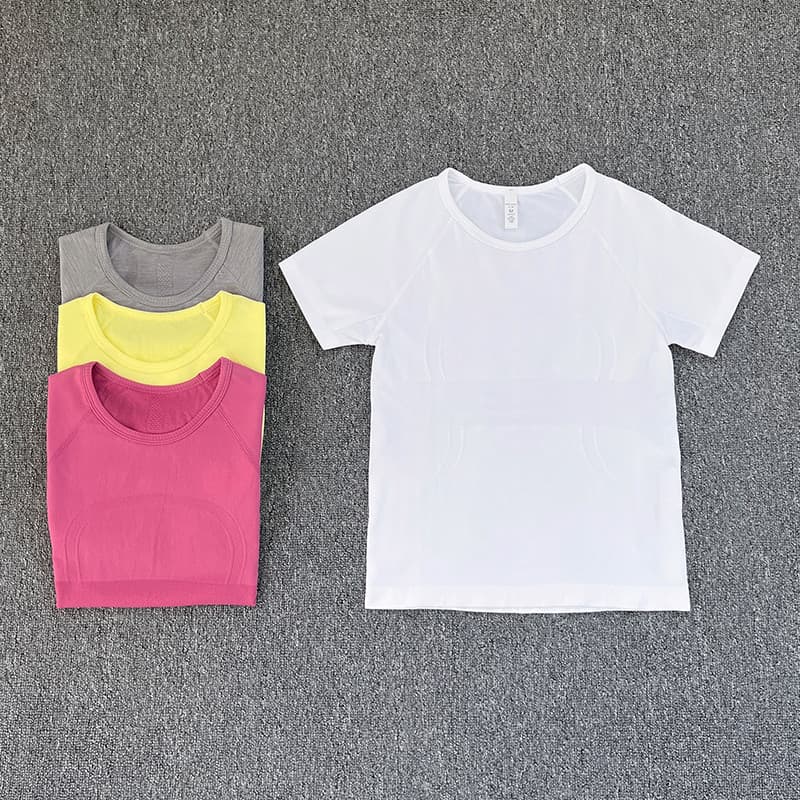 Esportes de manga curta feminino Casual correndo camiseta apertada roupas de Yoga topo respirável de secagem rápida Pila