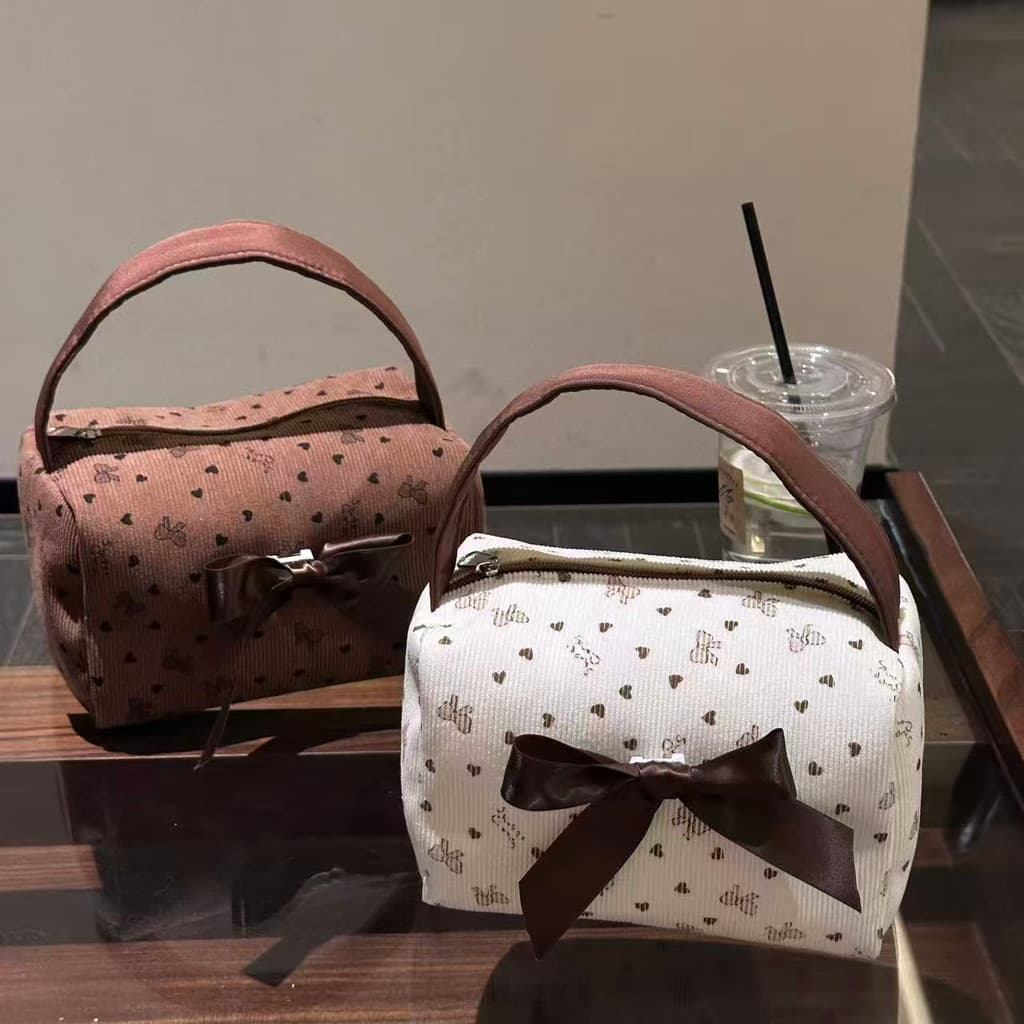 Bolsa cosmética com laço de alta qualidade de grande capacidade Bolsa impressa Bolsa de armazenamento de cosméticos da m
