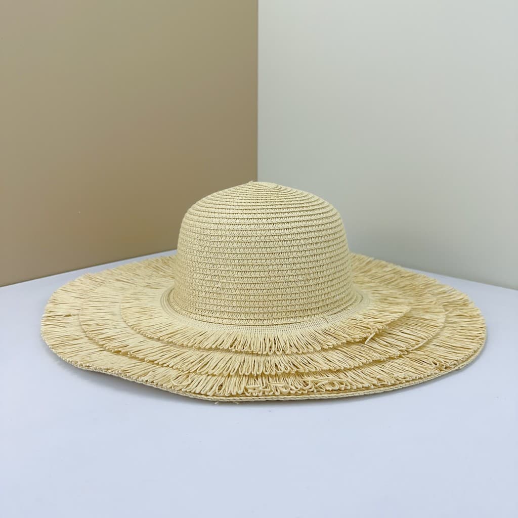 Nicho influenciador estilo celebridade chapéu de palha de aba grande feminino temperamento borla beira-mar férias praia