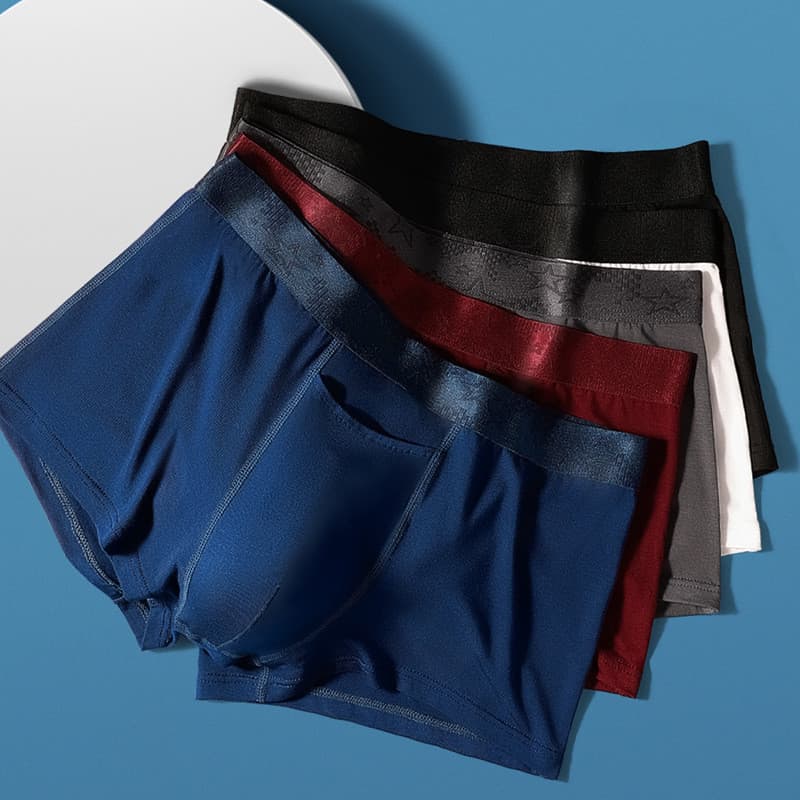 Cuecas boxer masculinas com separação em formato de bala, cor sólida, respiráveis, adequadas para jovens estudantes.