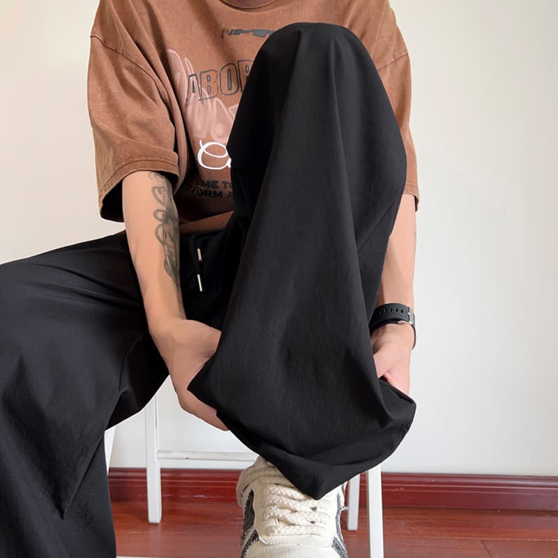 Novo produto verão fino macacão de perna larga masculino Drape de secagem rápida esportes casuais calças masculinas solt
