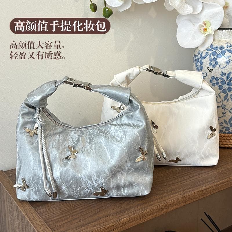 Novo saco cosmético chinês feminino 2025 novo estilo High-End portátil saco de armazenamento de cosméticos fabricante de