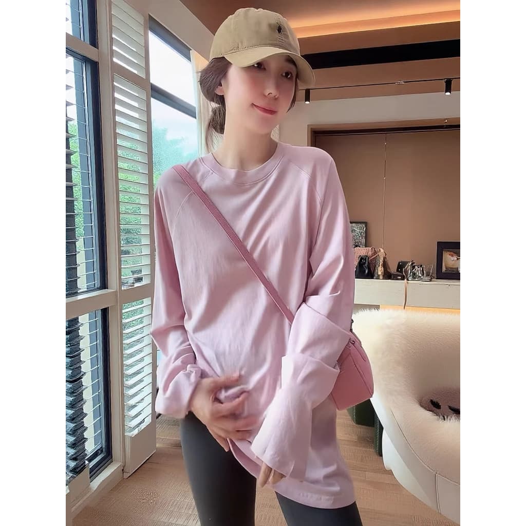 Camiseta feminina solta de manga comprida estilo preguiçoso de comprimento médio 2026 início da primavera cobrindo bunda