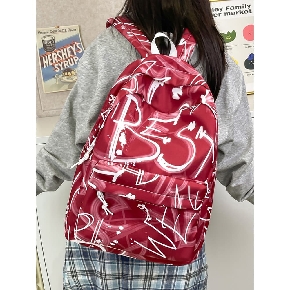 Mochila escolar estampada Graffiti de alto valor feminina novo estilo estudantes da escola primária leve All-match mochi