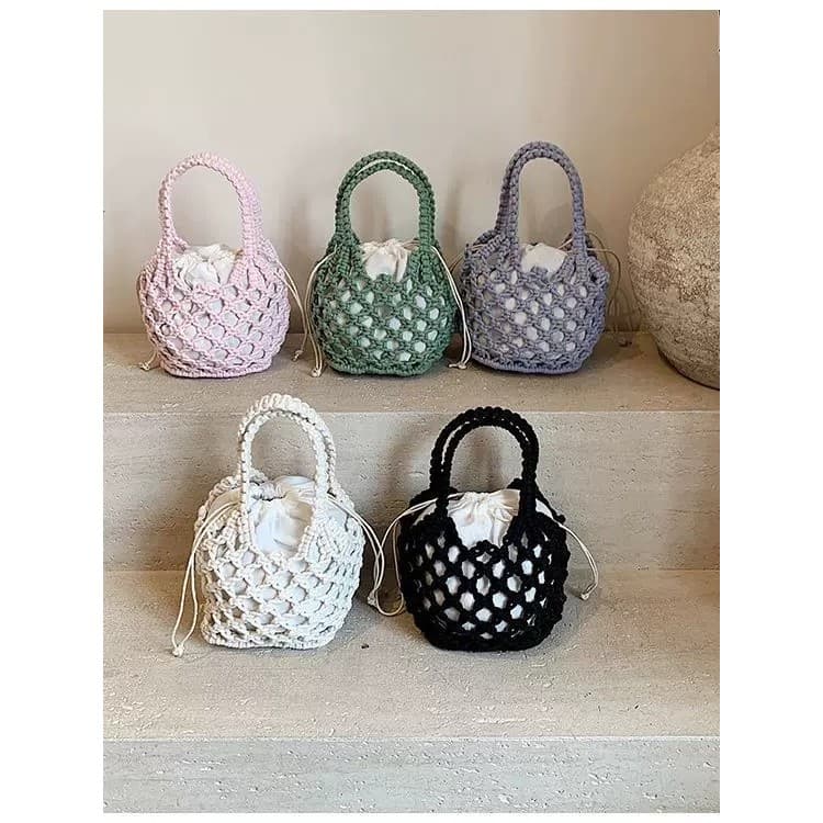 Novo estilo coreano estilo preguiçoso saco nicho estilo não-colisão portátil tecido saco oco mão High-End bolsa bolso lí