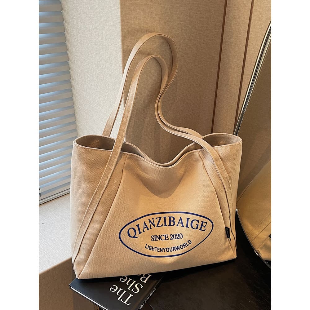 Simples bolsa de lona de grande capacidade feminina 2025 novo estilo moda bolsa de ombro estudante portátil All-Match cl