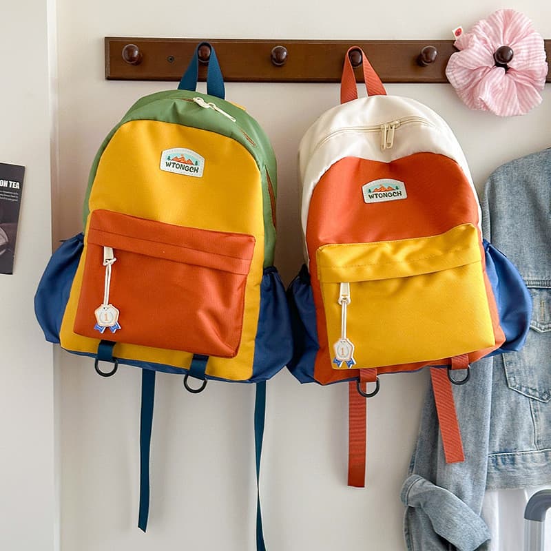 Nova mochila infantil com blocos de cor, mochila escolar fofa para meninos e meninas, mochila de viagem casual e leve.