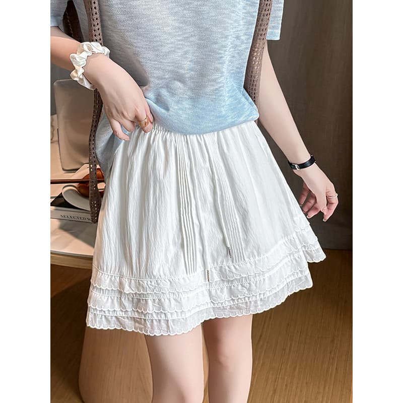 Saia de bolo de renda branca saia curta feminina verão Anti-reflexo saia evasê amarrada saia Casual estilo curto
