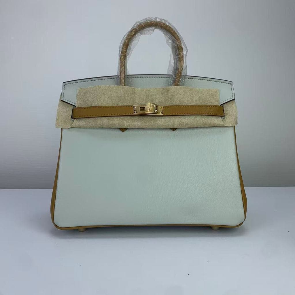 Versão de cor padrão couro genuíno platina Casual cor de natal combinando estilo doméstico. 25 bolsas de couro francês