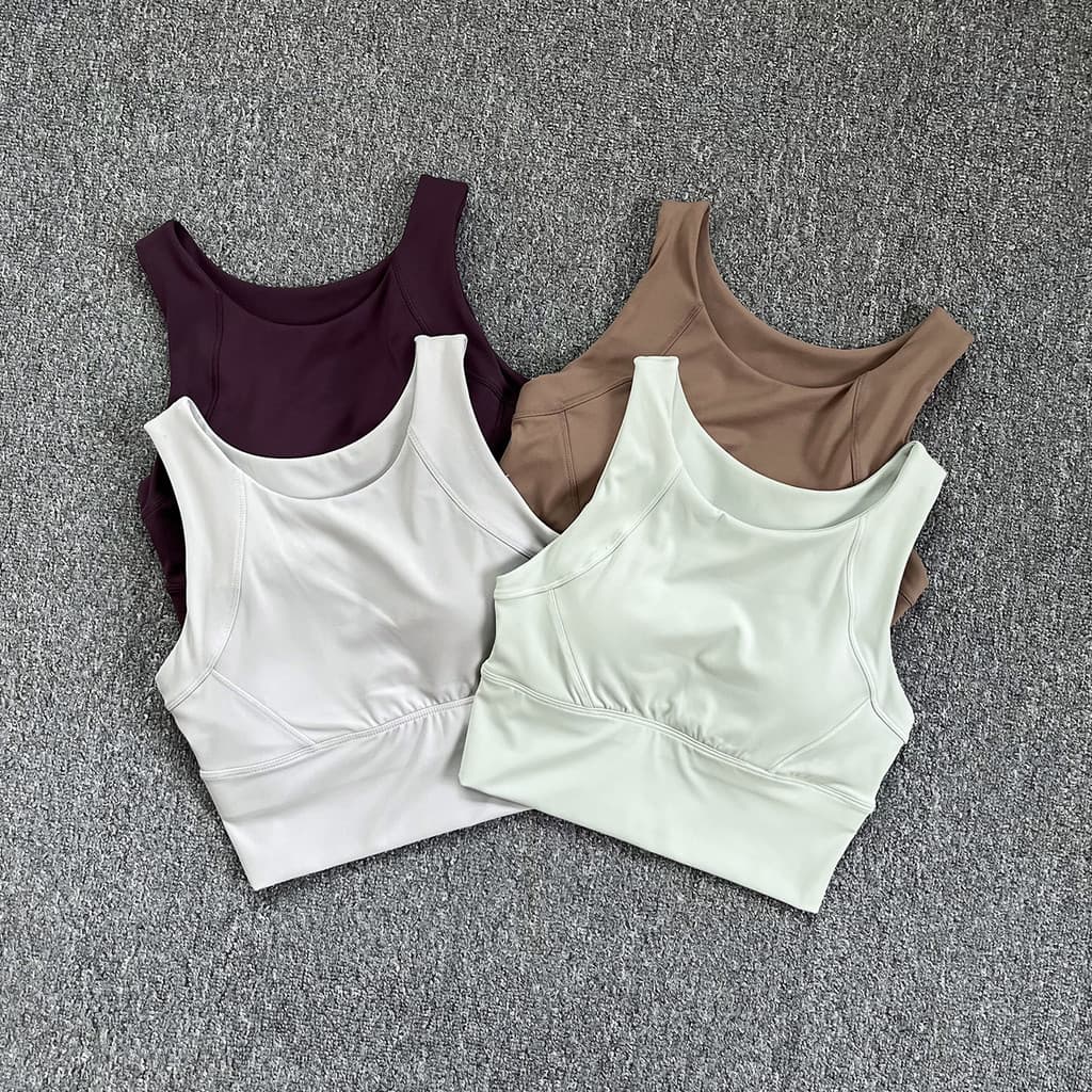 2026 roupa interior esportiva de alta intensidade feminina correndo à prova de choque copo de uma peça sutiã de Fitness