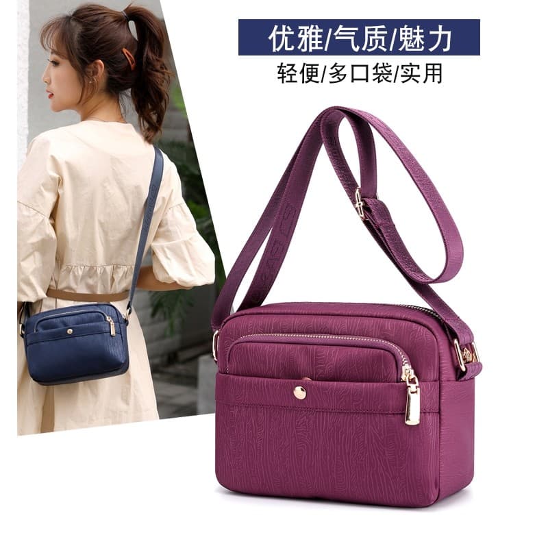 Bolsa mensageiro de náilon feminina pequena bolsa 2023 novo estilo verão mãe de meia-idade mochila Oxford pano Mini ombr
