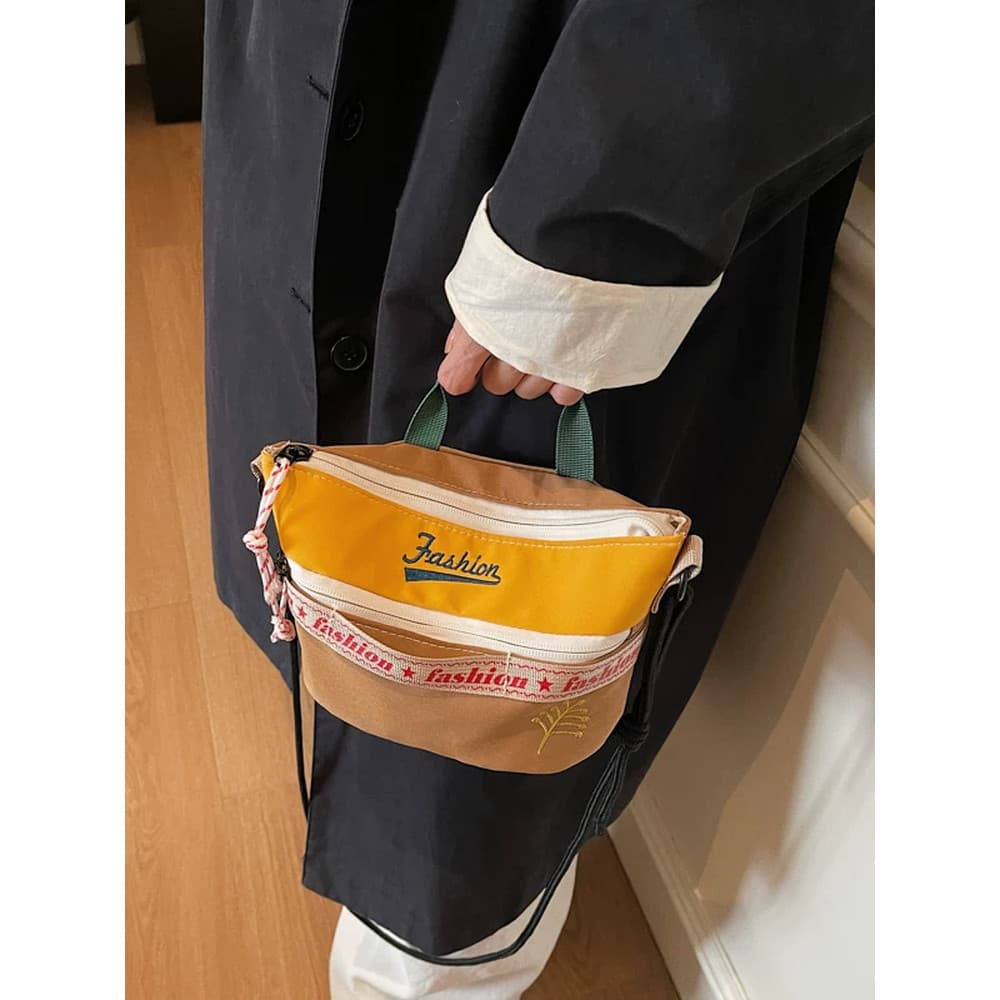 Coreano coreano lona 2026 Super quente mensageiro pequeno saco Casual náilon contraste cor bolsa estudante festa leve câ