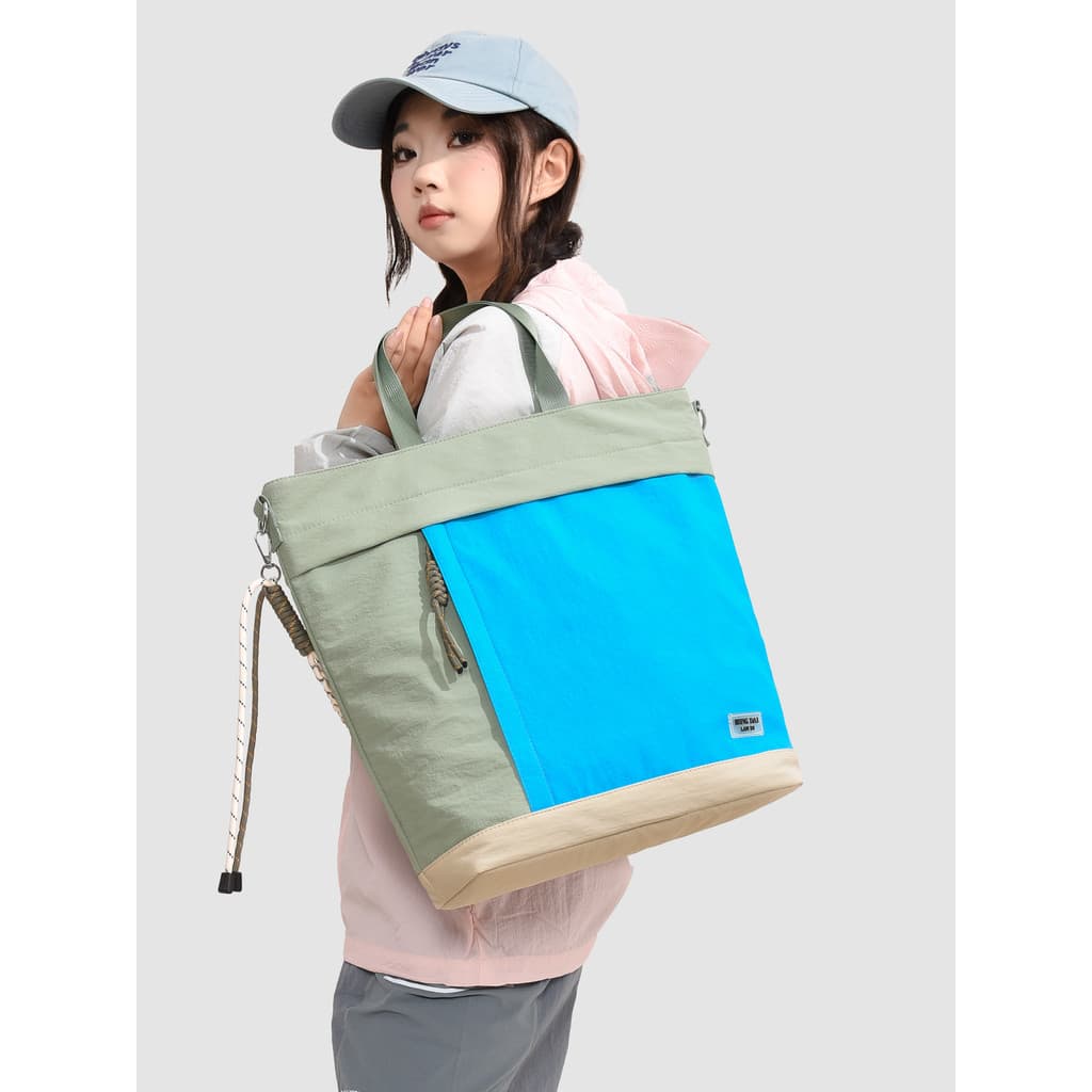 Bolsa leve de grande capacidade feminina 2026 novo estilo dopamina bolsa de viagem ao ar livre All-Match Commuter bolsa