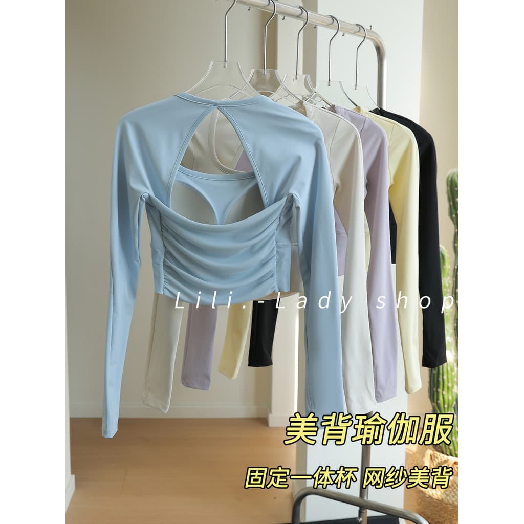 Esportes topo feminino 2026 novo estilo de manga comprida único bonito roupas de Yoga profissional Pilates bonito treina