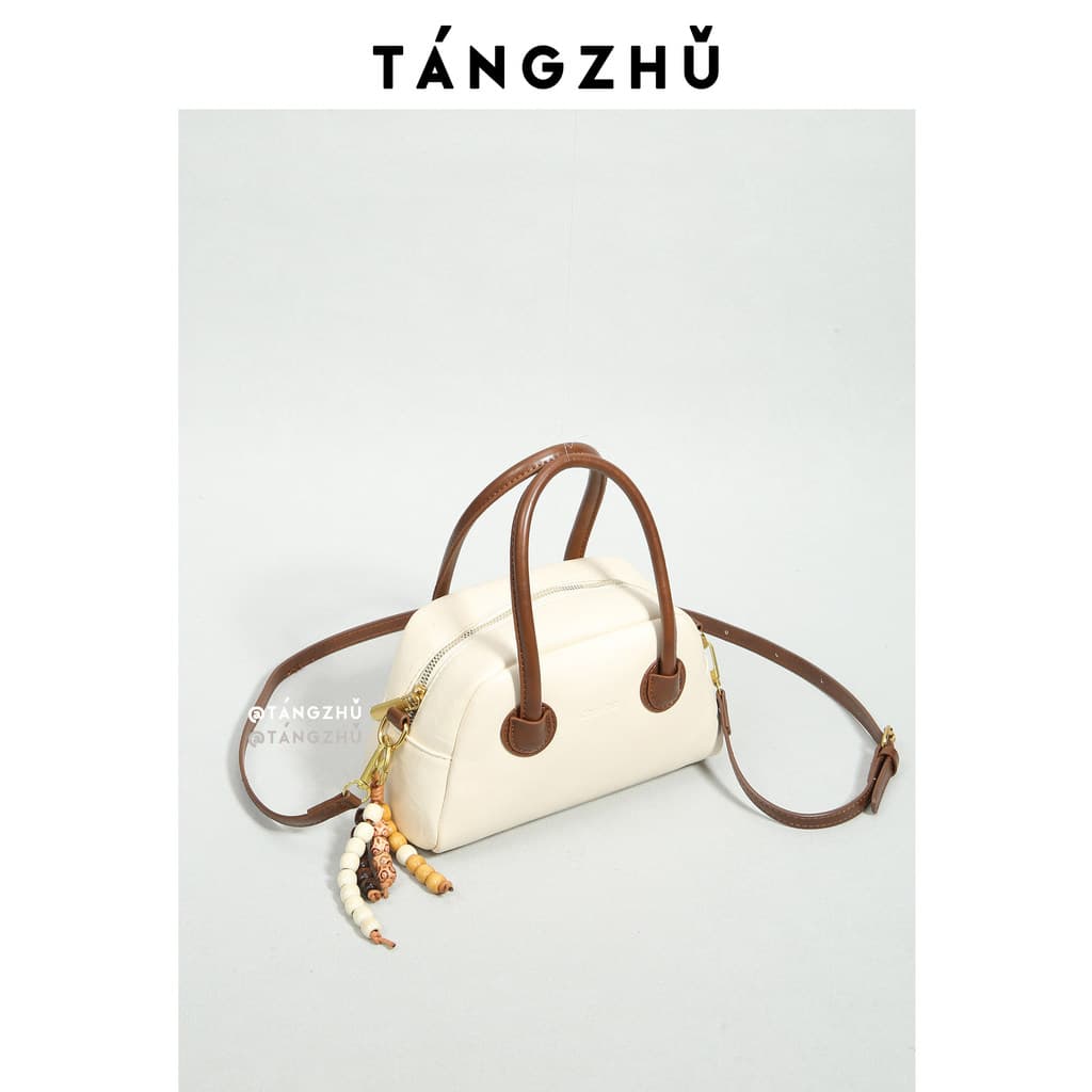 Bolsa bolsa feminina T Tangzhu Boston travesseiro saco feminino 2026 novo estilo contraste cor bolsa moda simples All-Ma