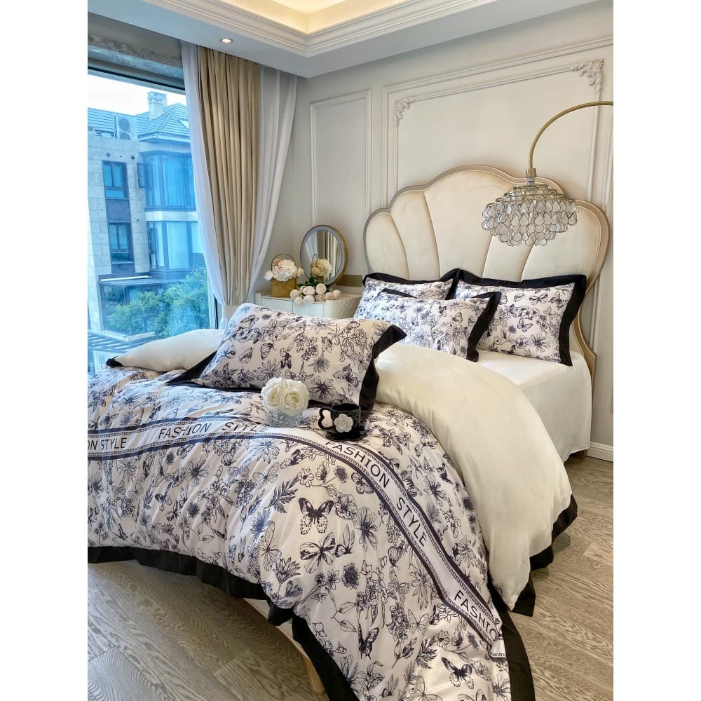 Hepburn estilo High-End algodão escovado conjunto de quatro peças puro algodão preto branco borboleta impresso capa de e