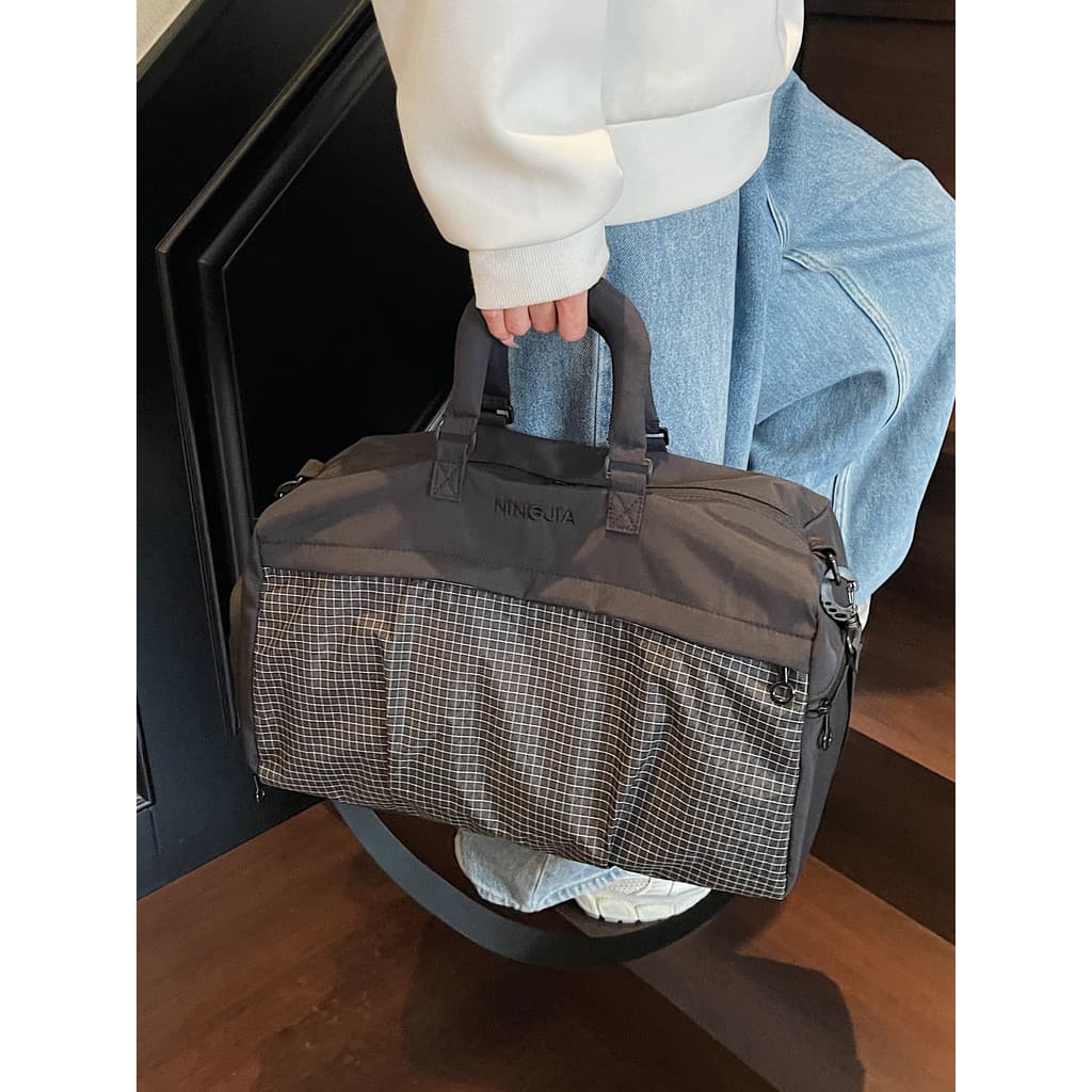 Bolsa de viagem de curta distância de grande capacidade feminina 2025 nova bolsa de bagagem leve bolsa de viagem de negó