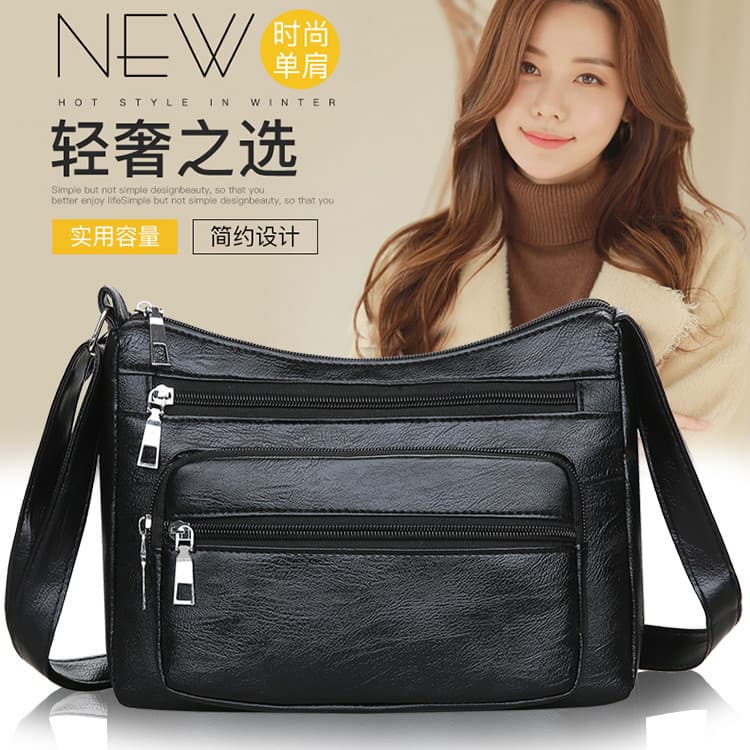 2024 Novo estilo de grande capacidade bolsa mensageiro de um ombro mochila feminina mãe de meia-idade bolsa de couro mac