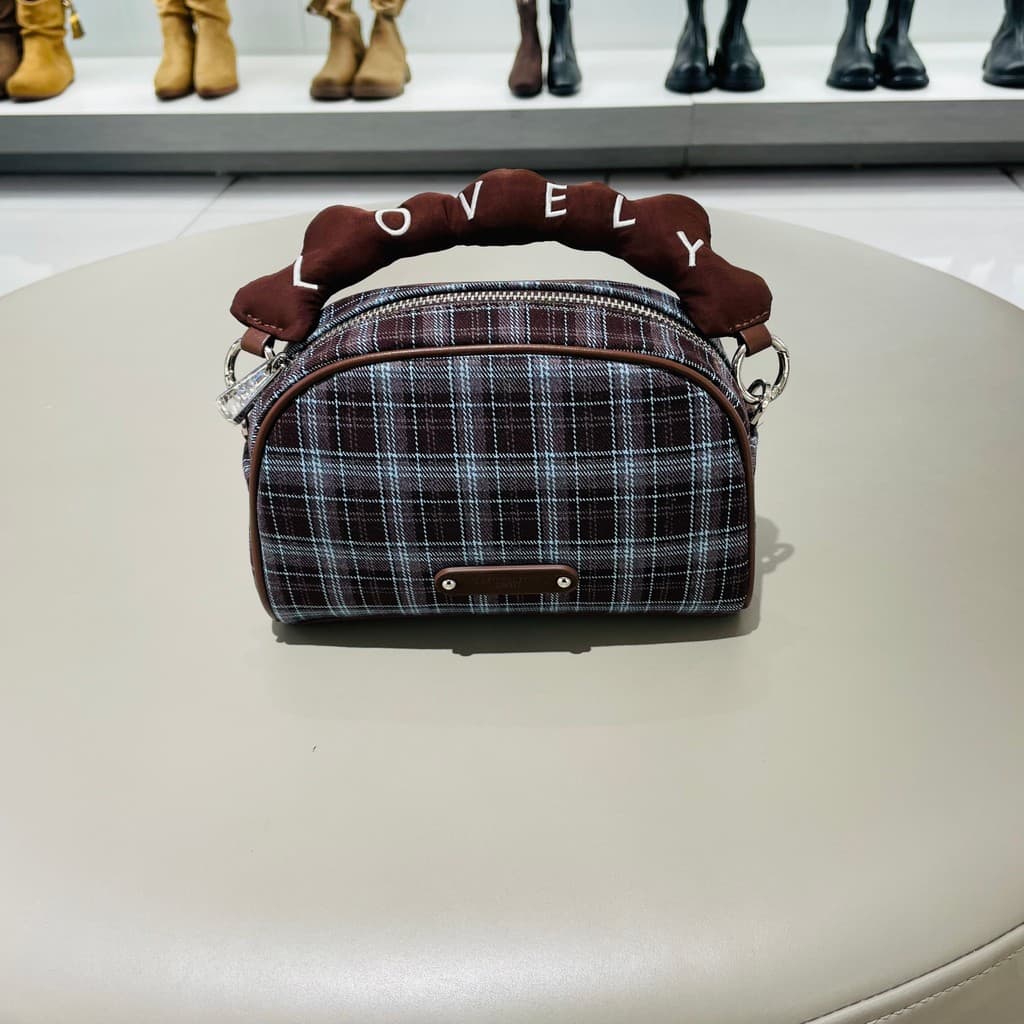 Zhuosini 2026 novo estilo elegante All-Match xadrez portátil saco de armazenamento feminino High-End nicho Design mensag