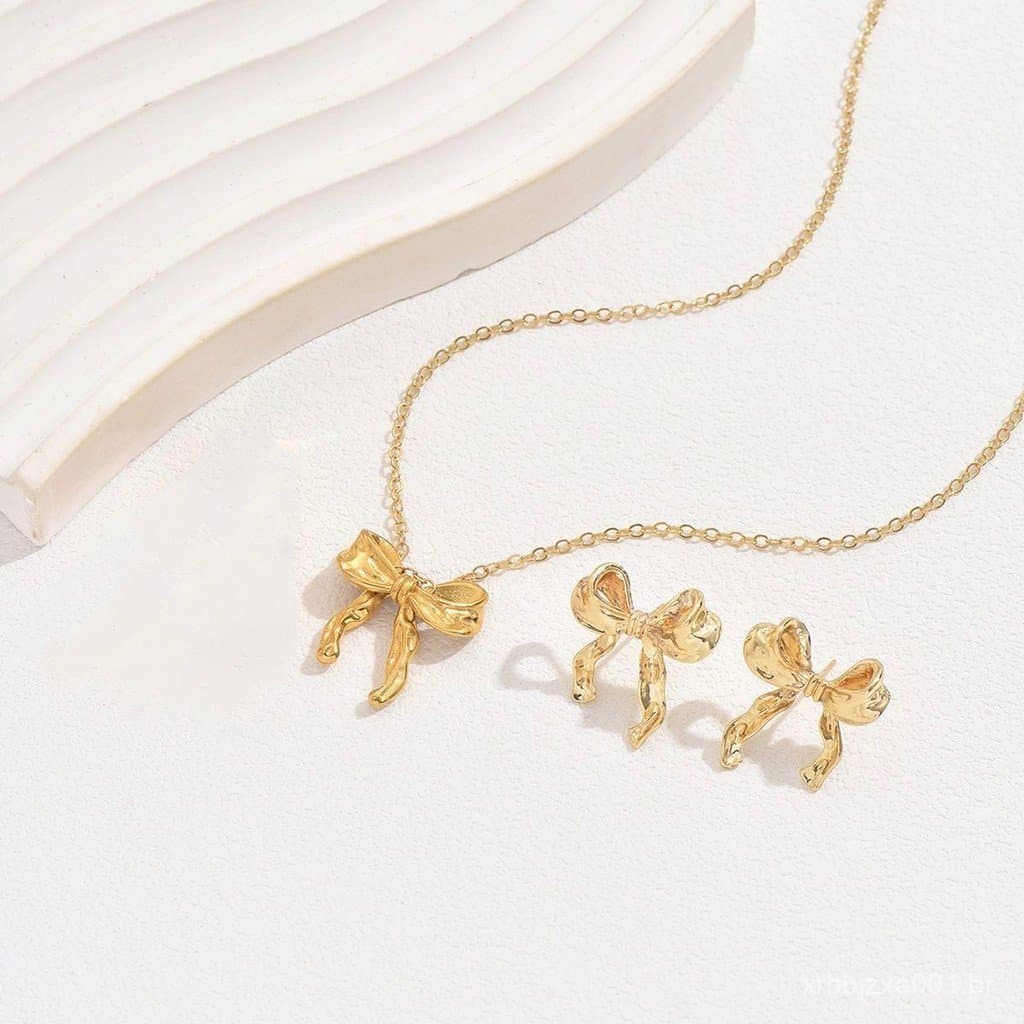 Conjunto Colar e Brincos Femininos com Laço Dourado em Aço Inoxidável Elegante e Delicado
