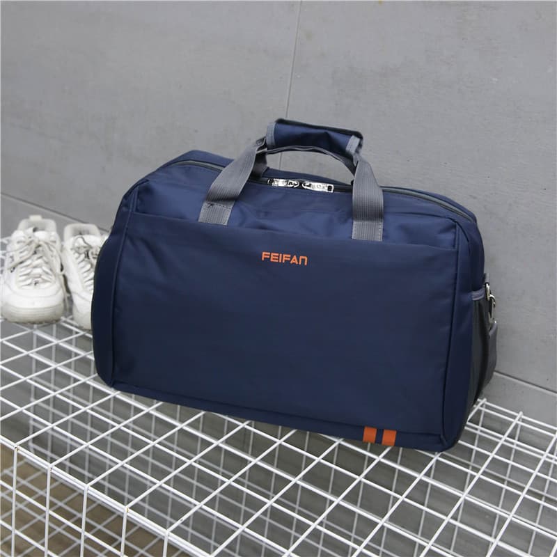 Versão coreana saco de viagem de grande capacidade portátil saco de viagem saco de roupas de bagagem feminino à pro