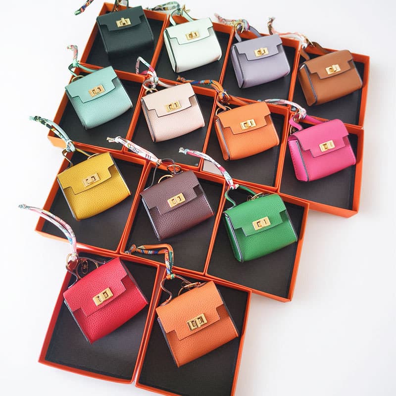 Mini saco pingente casa pequeno saco de luxo luz novo estilo moda ornamentos batom saco fone de ouvido saco chave do car