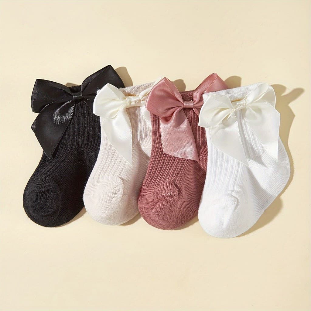 4 pares de meias de cano médio para bebês, para primavera e outono, decoradas com laços tridimensionais.