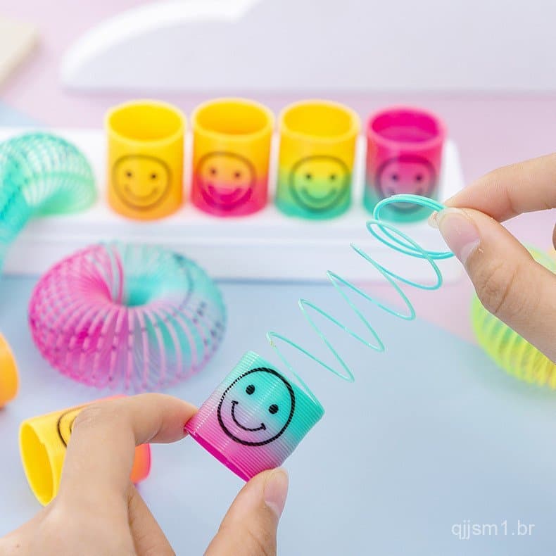 Pacote com 10 Brinquedos Coloridos em Forma de Espiral para Crianças, Divertidos Anéis Elásticos Arco-Íris com Carinha S