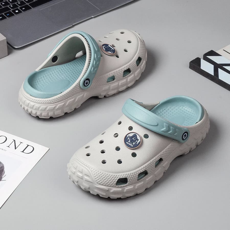 Buraco sapatos masculinos exterior Wear na moda eva merda-piso sentir Baotou chinelos juventude Casual sandálias de prai