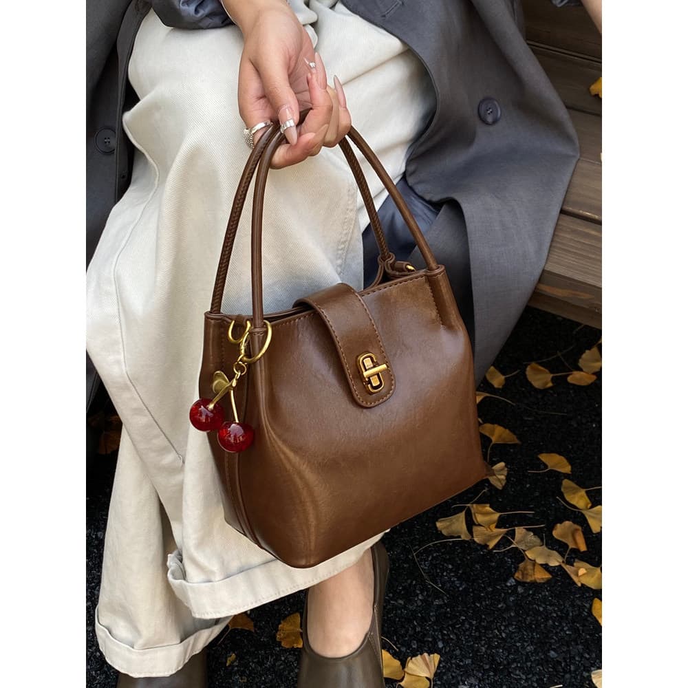 bolsa feminina Bolsa Francês Retro portátil balde saco feminino 2026 outono inverno novo estilo nicho Commuter bolsa de