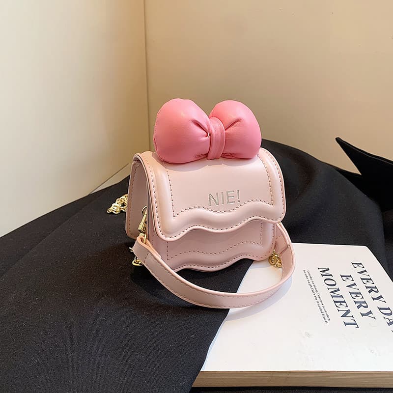 Outono novo estilo versão coreana Mini crianças meninas bolsa de ombro arco corrente cruz-corpo pequeno saco pai-filho s