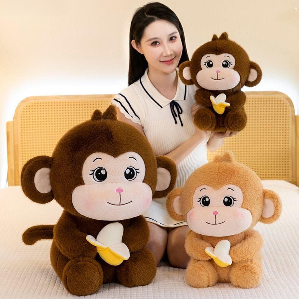 O Brinquedo de Pelúcia Shenda Banana Monkey é um boneco fofo de desenho animado feito de material de algodão PP.