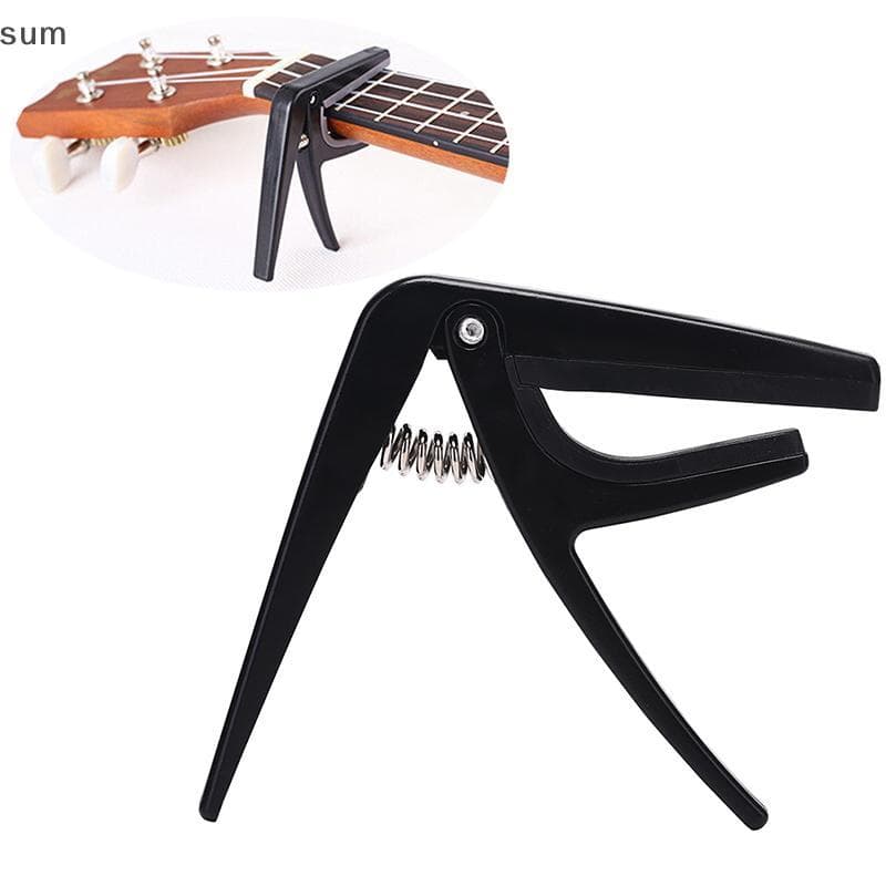 [sum] Ukulele Capo Profissional Com Uma Mão Qui Change Acessórios De Aço Plástico BR