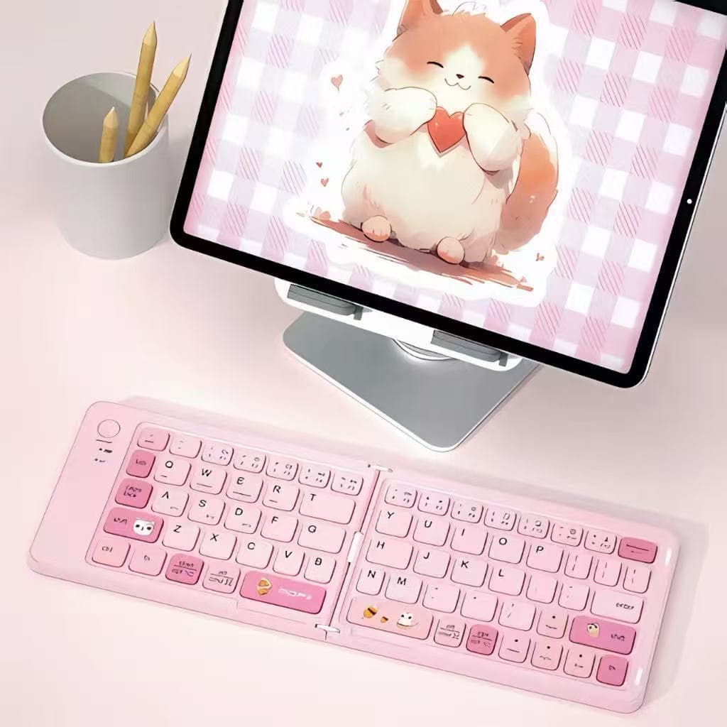 Teclado Bluetooth sem fio dobrável com desenho animado, mini teclado portátil com carregamento para celulares e tablets