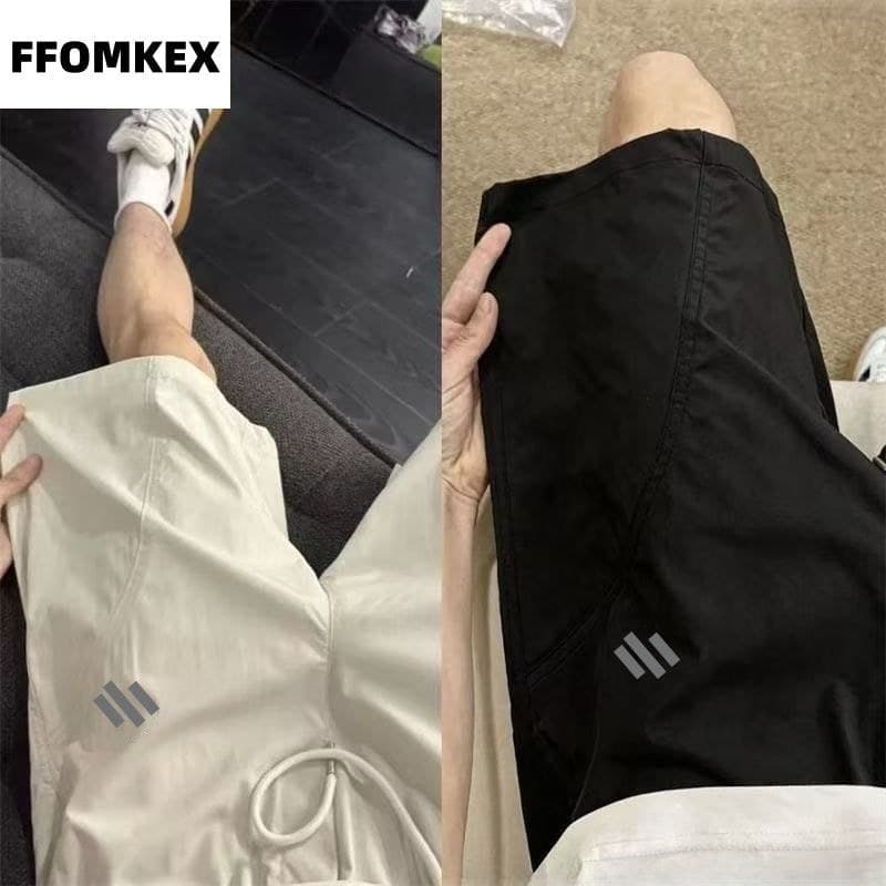 Macacão de secagem rápida tamanho grande Shorts masculino respirável seda gelo calças cortadas na moda esportes american